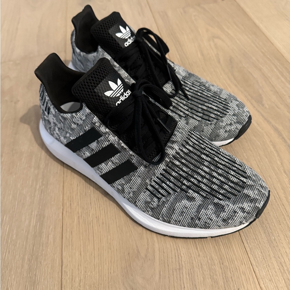 Adidas Black and White running shoes